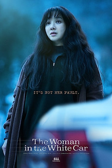 889238 the woman in the white car 0 230 0 345 crop